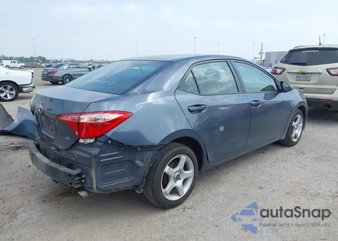 2017 Toyota Corolla Le z USA, uszkodzony, nr VIN 5YFBURHE6HP658876